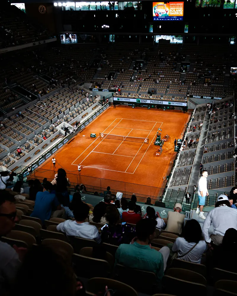 The clay court at Roland-Garros during a match