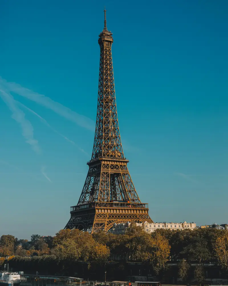 The Eiffel Tower against a clear blue sky
