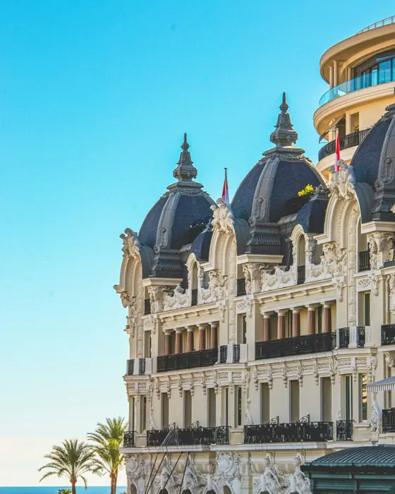 The domes of a Monte-Carlo palace hotel against a clear sky